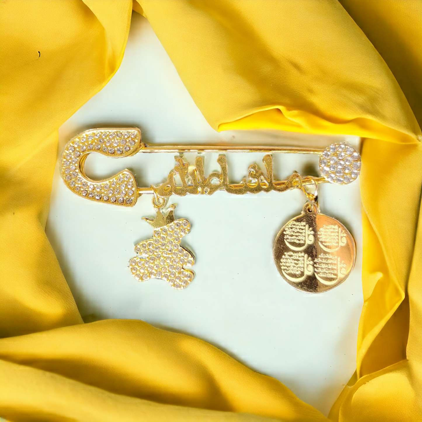 Masha Allah Baby Pin With T and  ( Arabic ) Golden and ( Transparent Color )( 4 QUL )