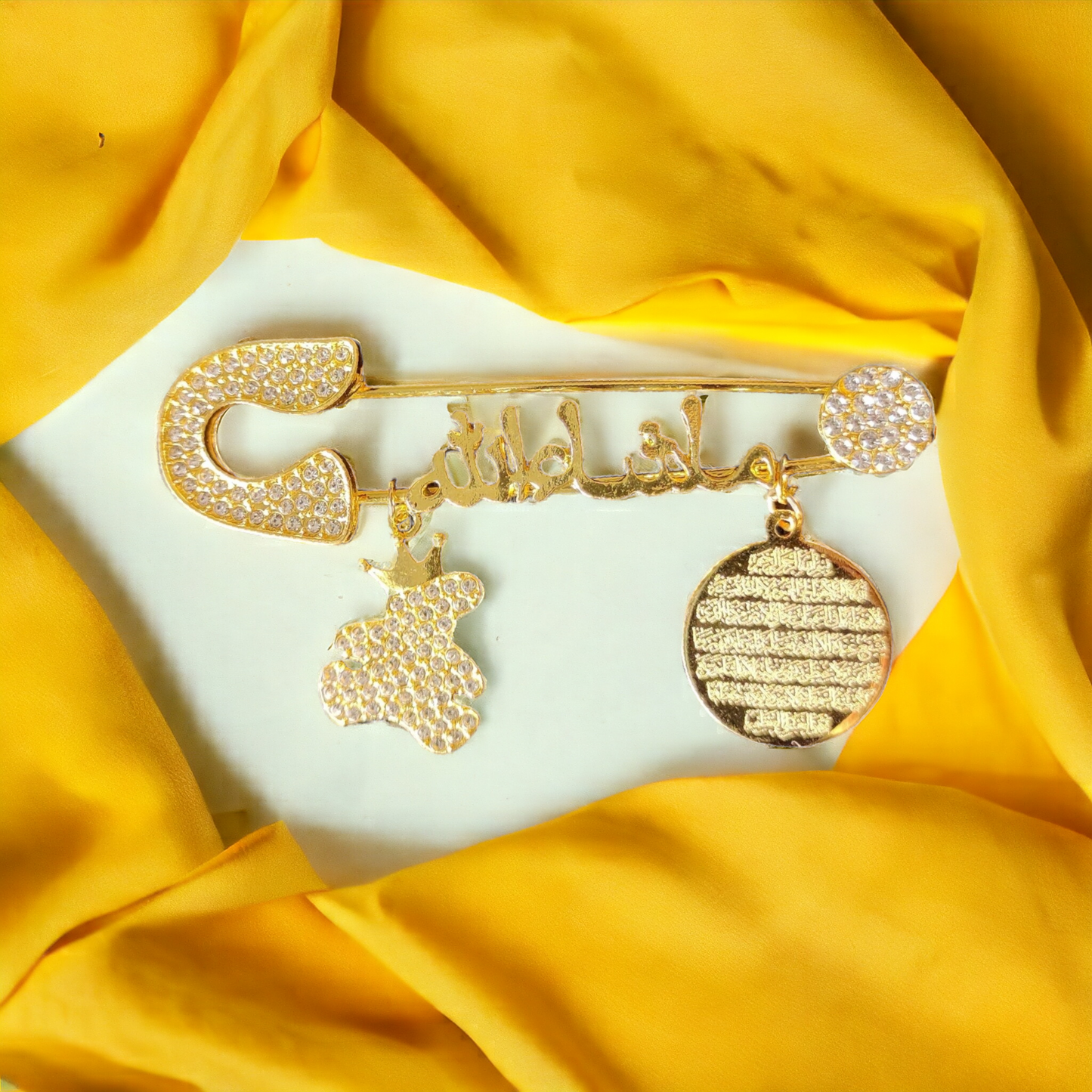 Masha Allah Baby Pin With T and  ( Arabic ) Golden and ( Transparent Color )( AK )
